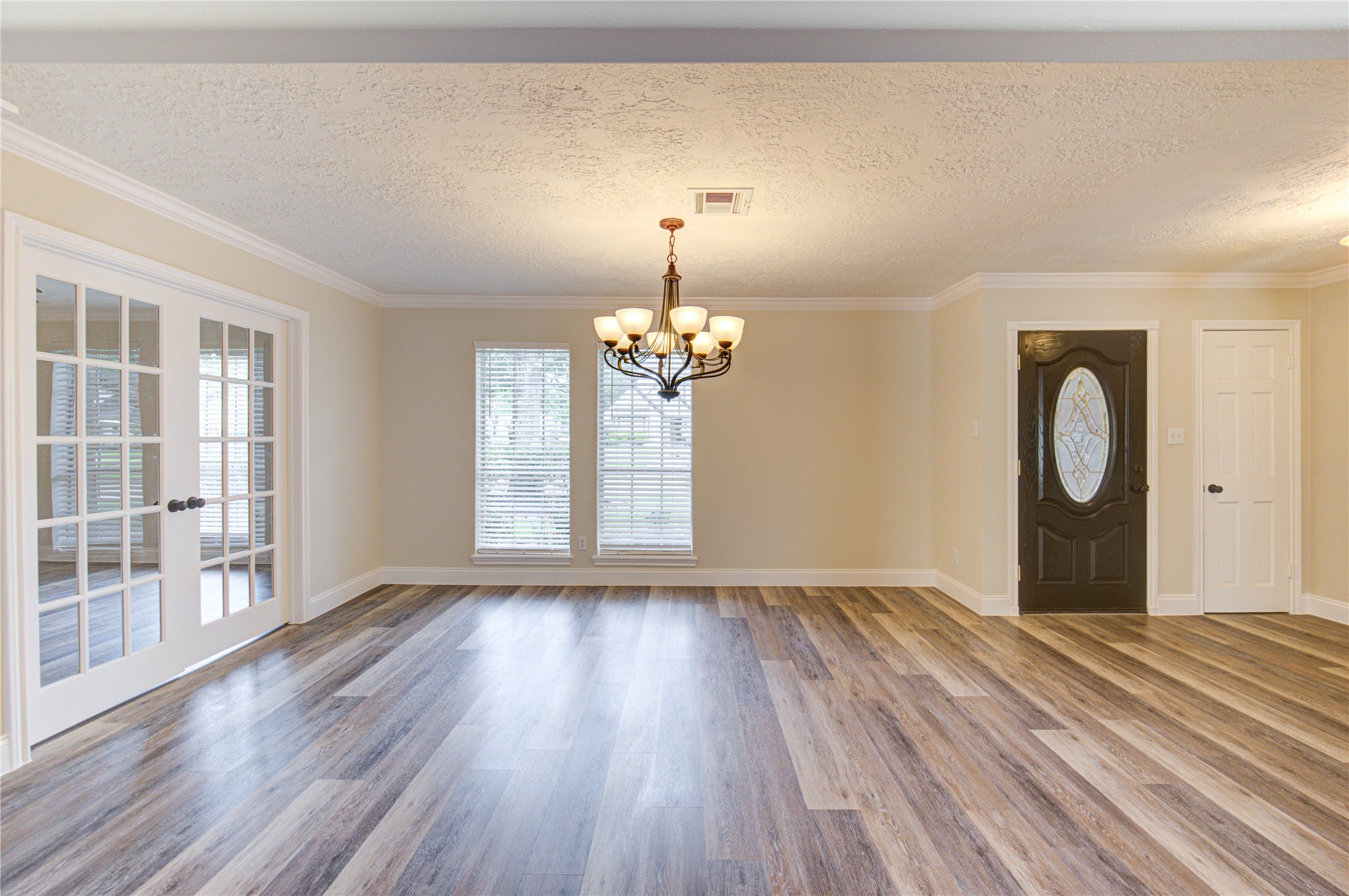 9115 Taidswood Drive Spring, TX 77379 - Photo 8 of 41 Here is another view of the formal dinging room, foyer and the home office.