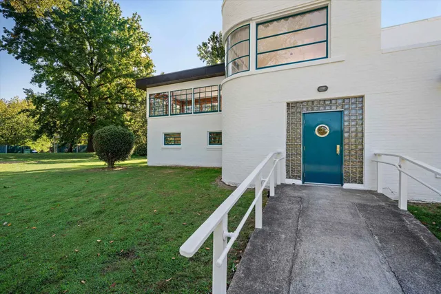 a house view with a backyard space