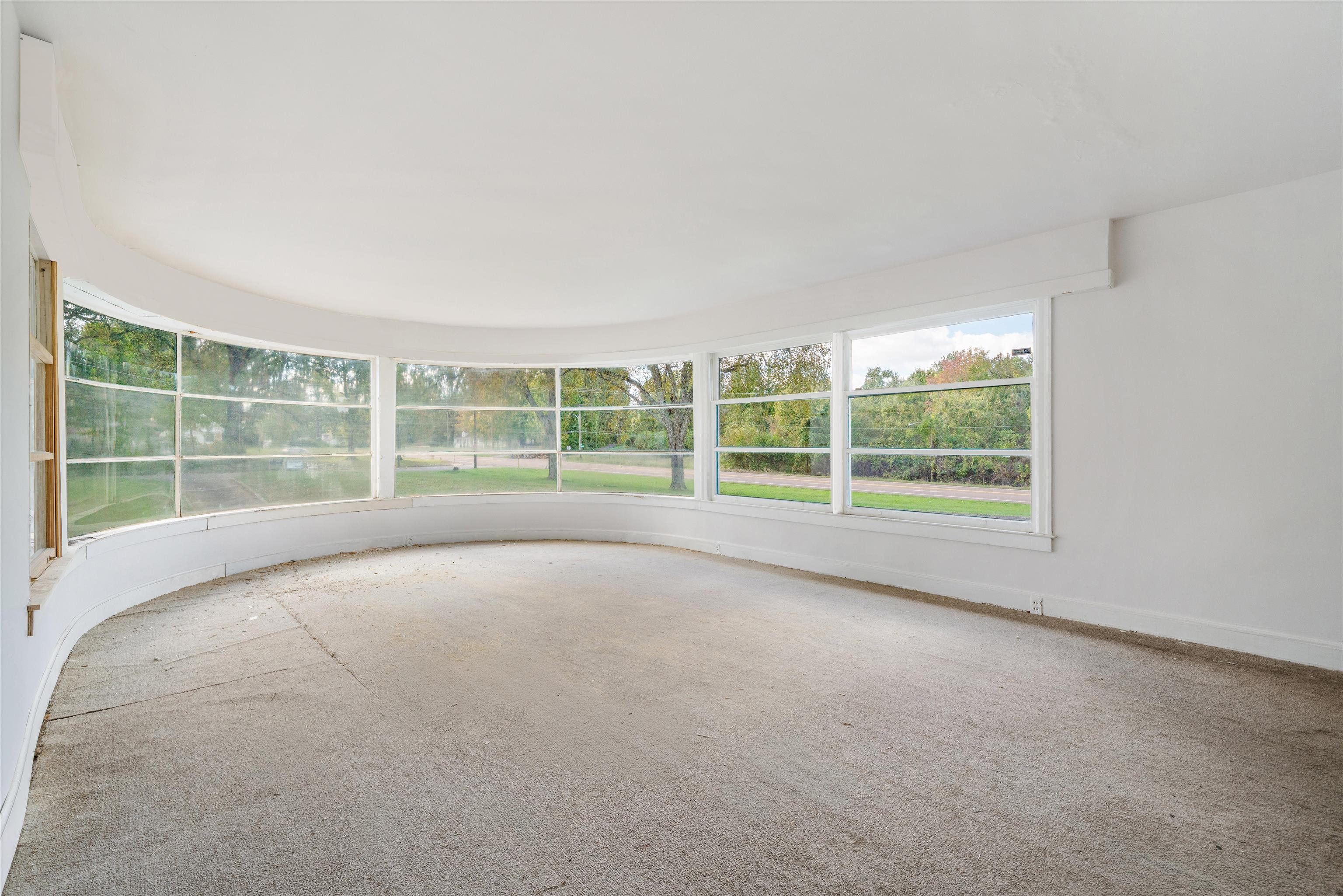 3590 Thomas Street Memphis, TN 38127 - Photo 20 of 39 a view of an empty room with a balcony