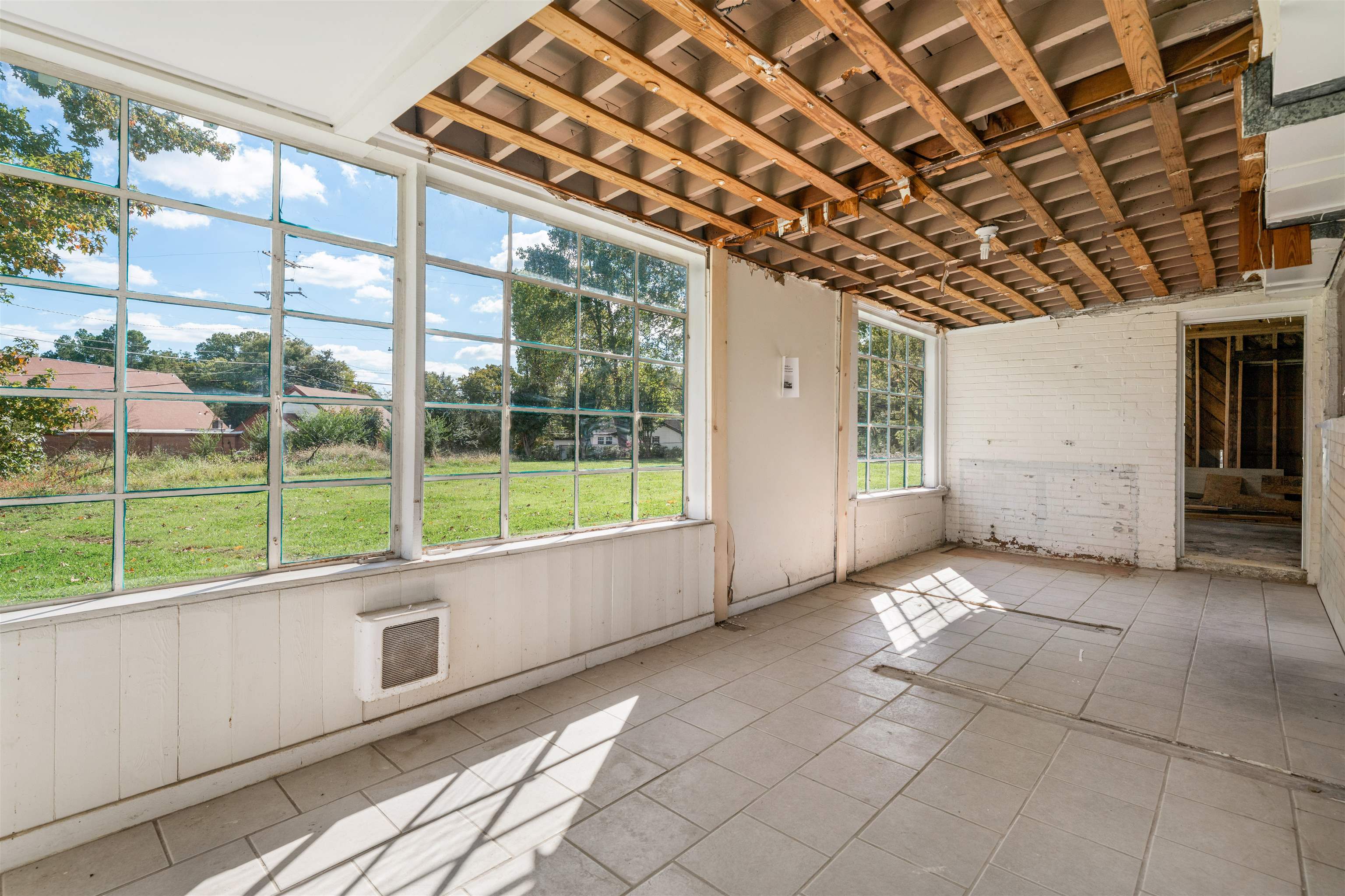 3590 Thomas Street Memphis, TN 38127 - Photo 29 of 39 a view of an empty room with windows