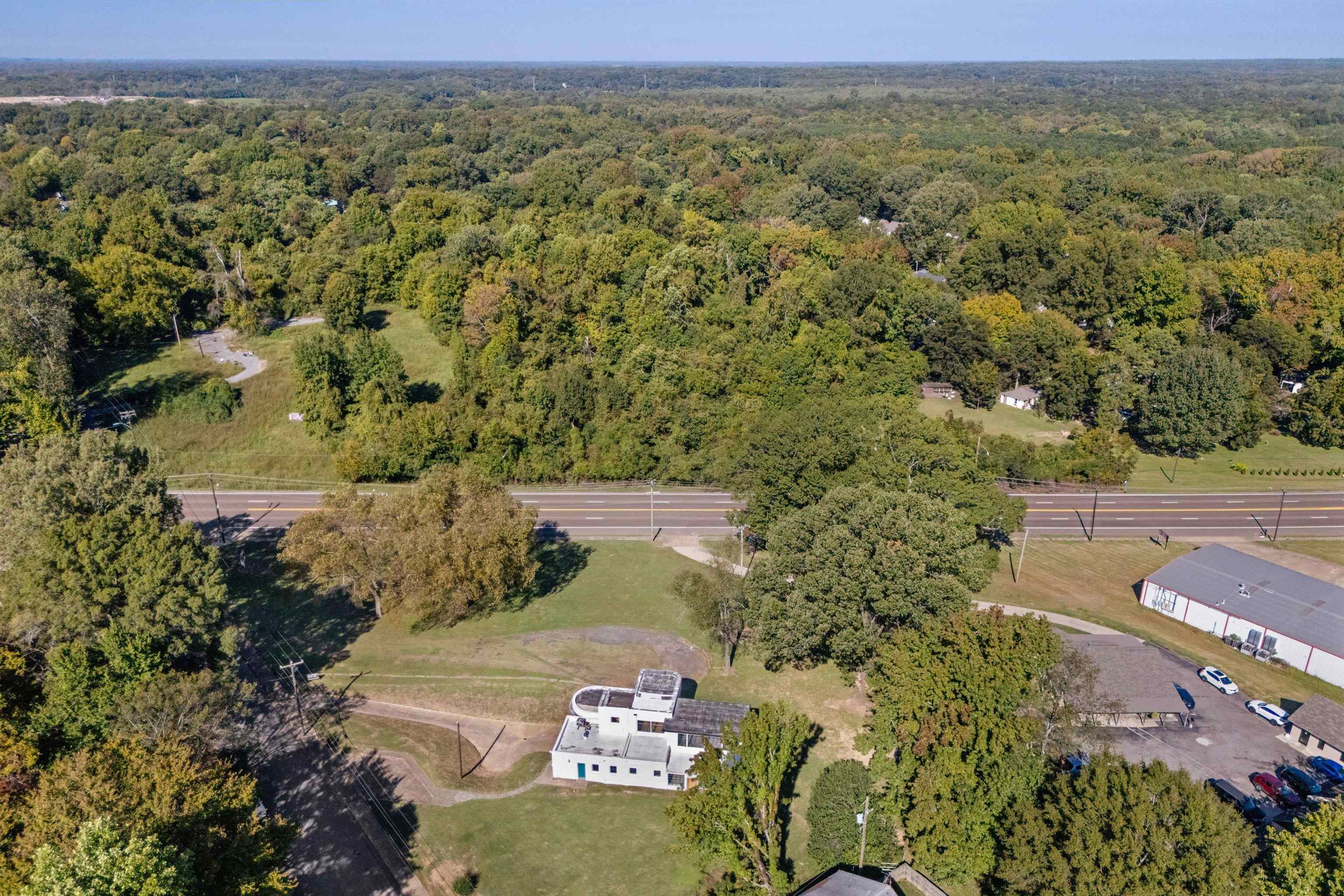 3590 Thomas Street Memphis, TN 38127 - Photo 3 of 39 an aerial view of a house with a yard