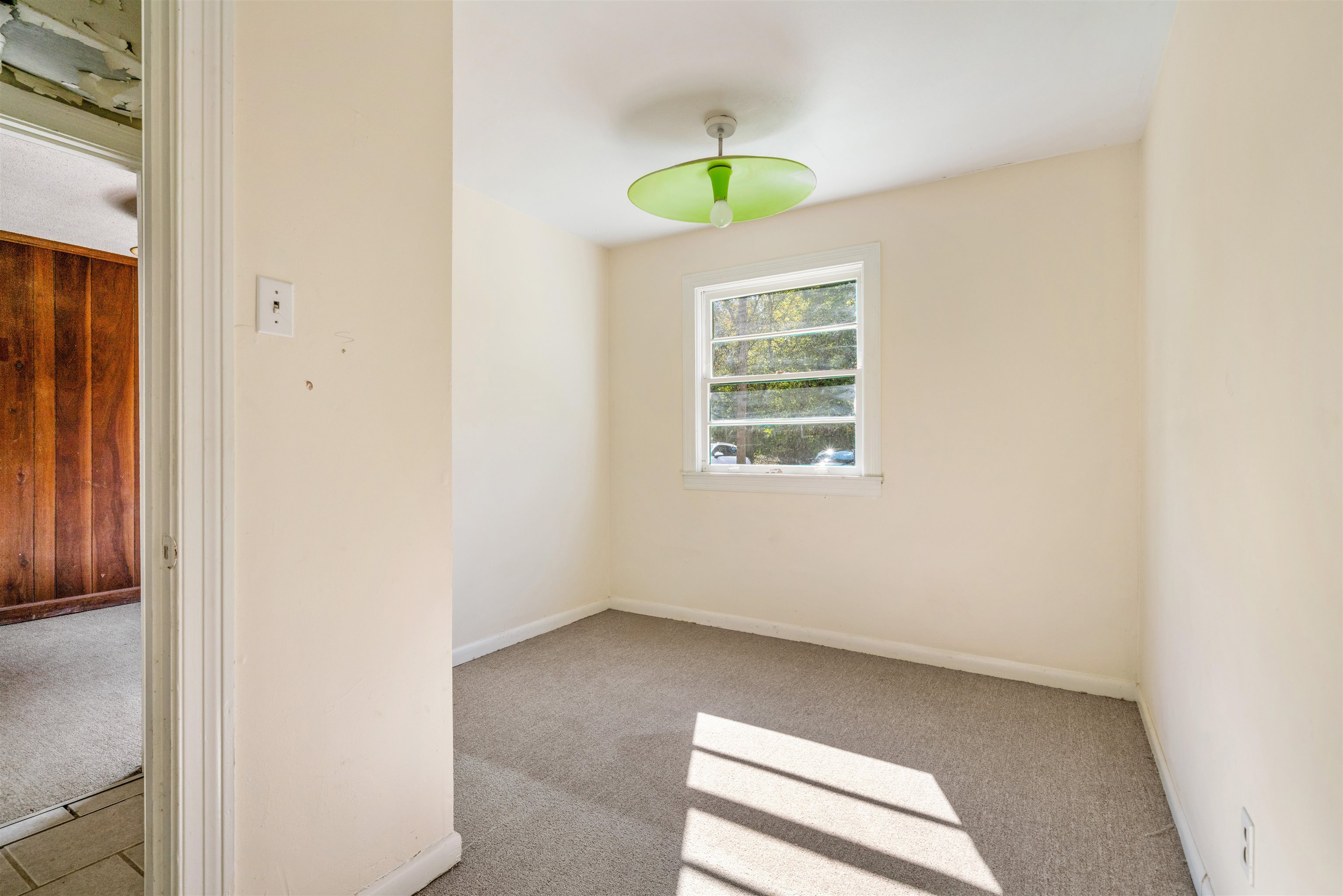 3590 Thomas Street Memphis, TN 38127 - Photo 32 of 39 an empty room with windows and closet
