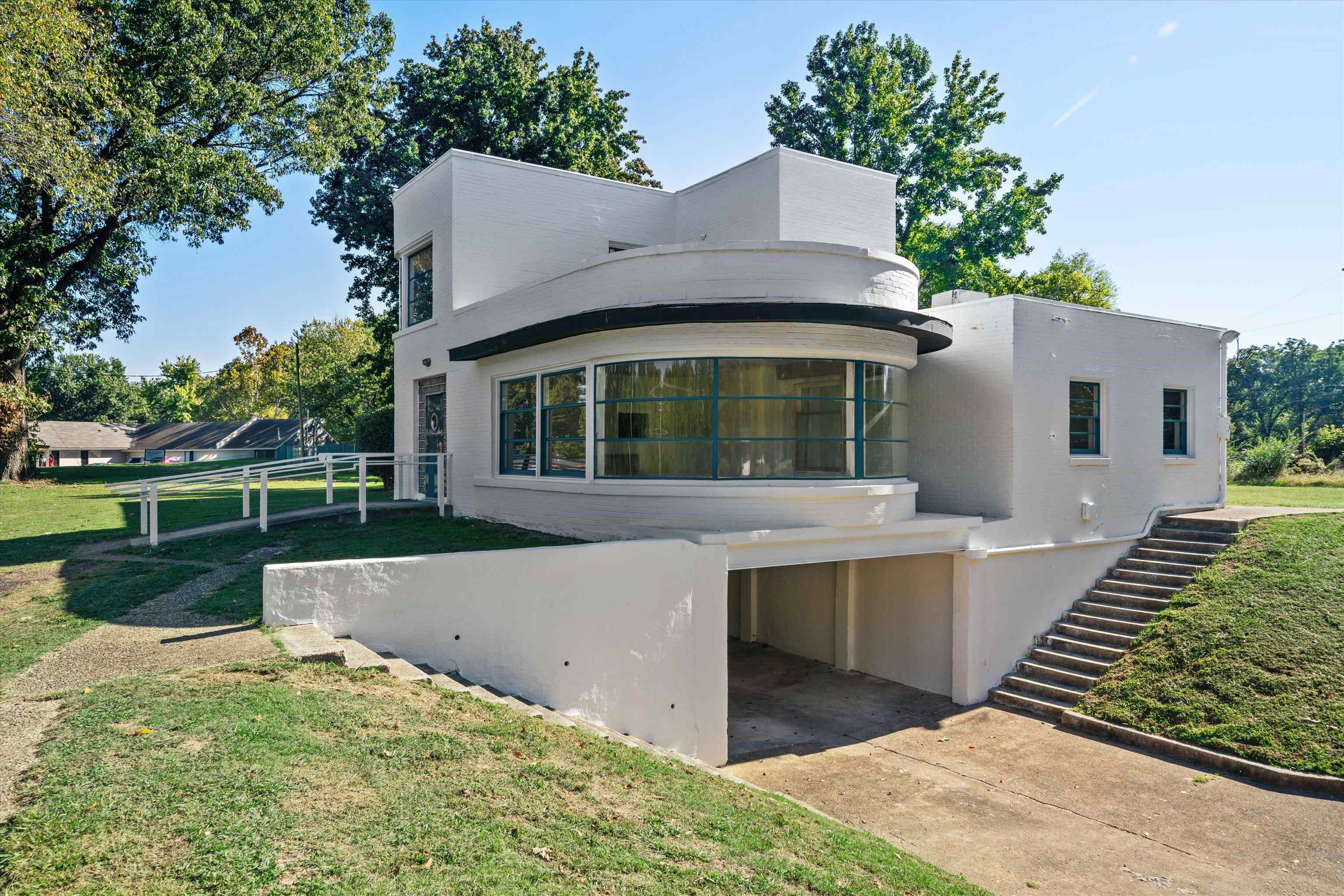 3590 Thomas Street Memphis, TN 38127 - Photo 8 of 39 an aerial view of a house with swimming pool