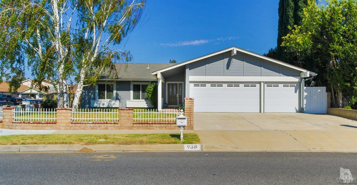 938 Erringer Road Simi Valley, CA 93065 - Photo 1 of 28 a front view of a house with a yard