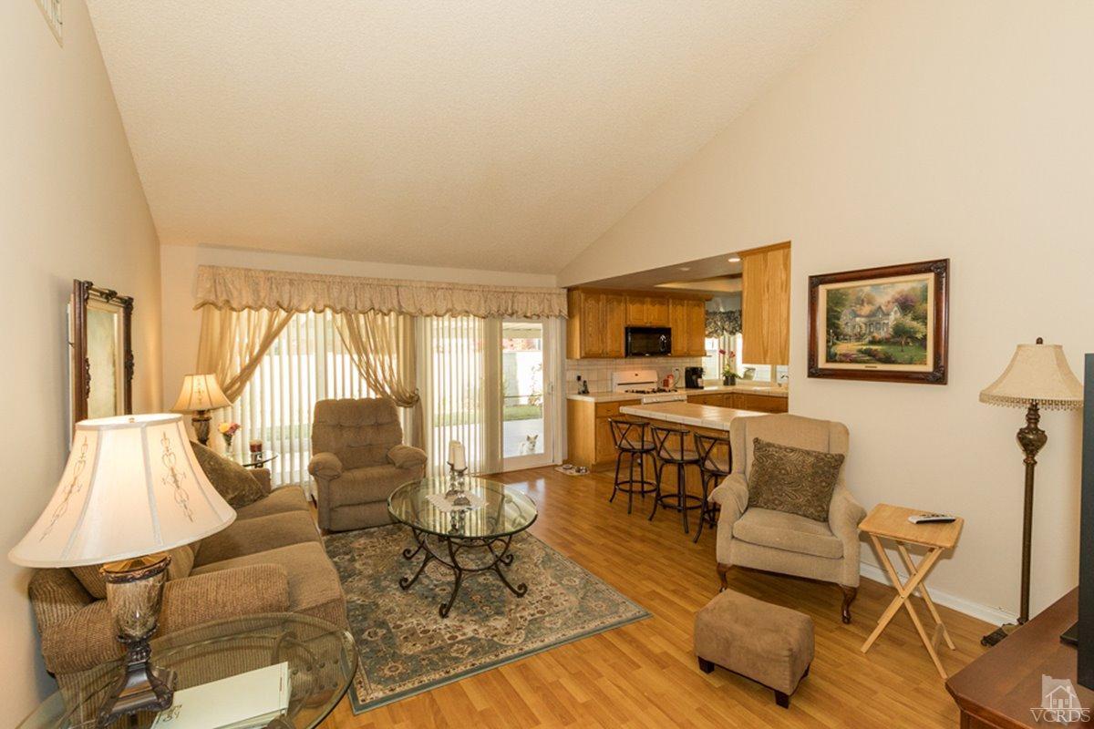 938 Erringer Road Simi Valley, CA 93065 - Photo 11 of 28 a living room with furniture and a large window