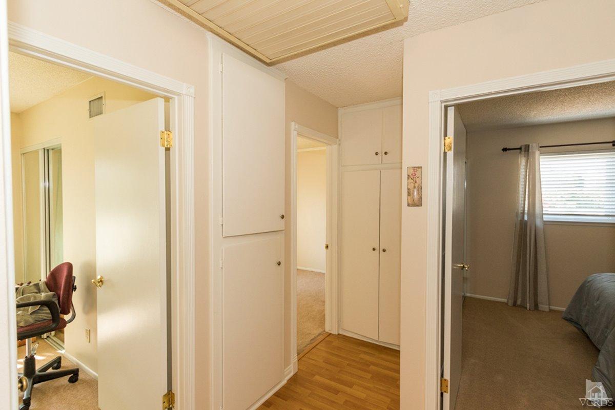 938 Erringer Road Simi Valley, CA 93065 - Photo 16 of 28 a view of a bathroom from a hallway