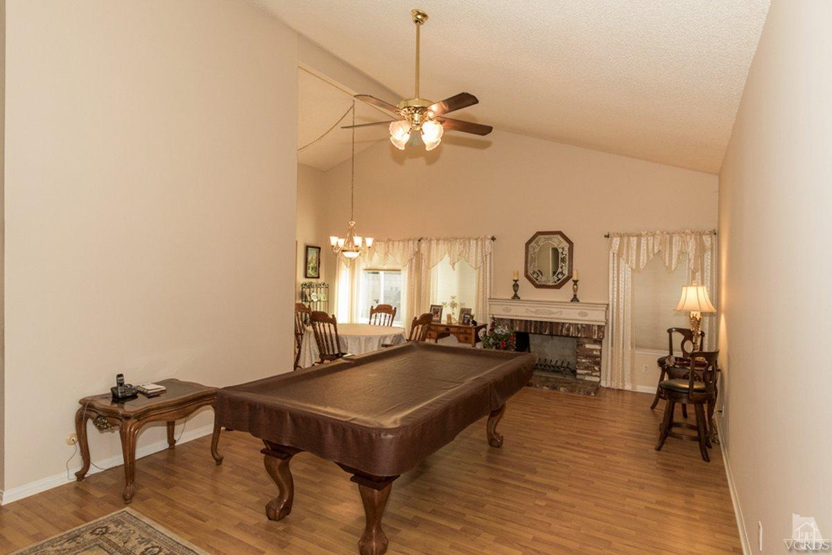 938 Erringer Road Simi Valley, CA 93065 - Photo 3 of 28 a very nice looking room with a table and chairs