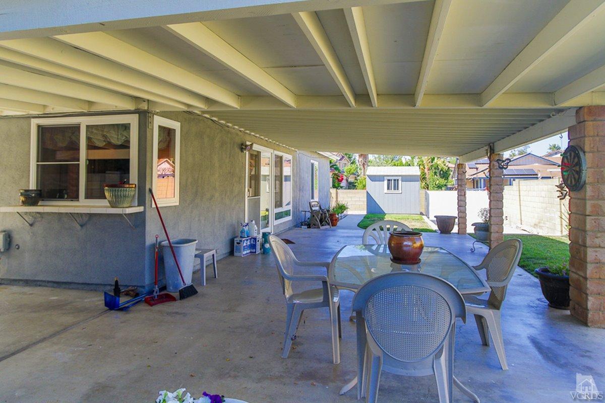 938 Erringer Road Simi Valley, CA 93065 - Photo 27 of 28 a view of a dining room with furniture window and wooden floor