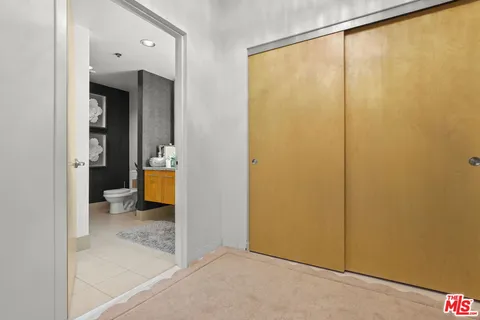 a view of a bathroom with a tub and a view of bathroom