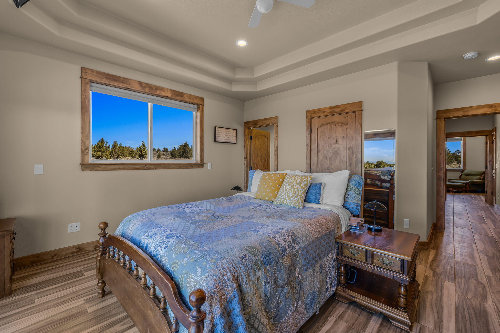 6040 Gravett Road Prineville, OR 97754 - Photo 20 of 77 a bedroom with a bed and wooden floor