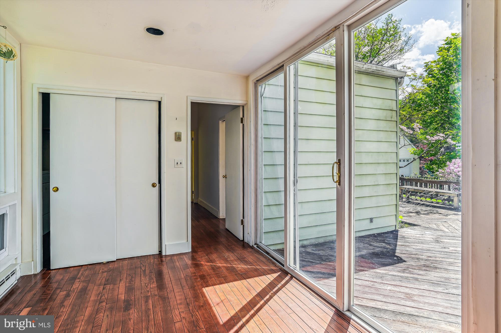 6211 Pinehurst Road Baltimore, MD 21212 - Photo 23 of 37 a view of a hallway with wooden floor and entryway