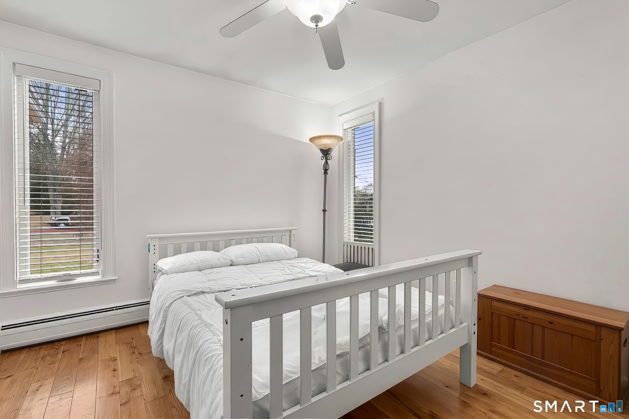 57 Gray Rock Road Trumbull, CT 06611 - Photo 25 of 40 a bed sitting in a bedroom next to a window