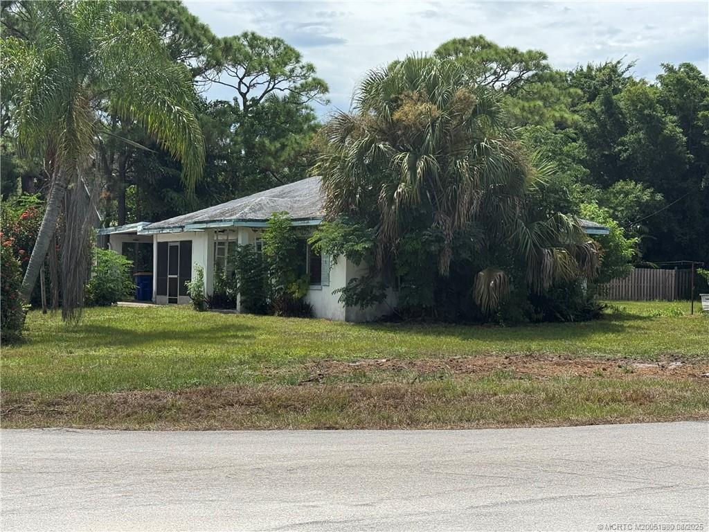 4729 Southeast Compass Way Stuart, FL 34997 - Photo 1 of 2 “Lots of Luck” double lot zoned R-3 w/ teardown