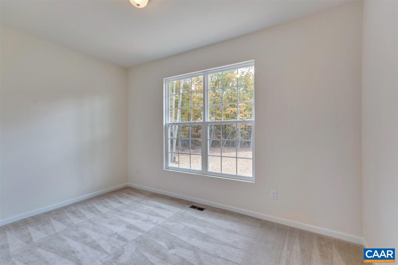 2031 Swift Run Road Ruckersville, VA 22968 - Photo 12 of 19 an empty room with a window