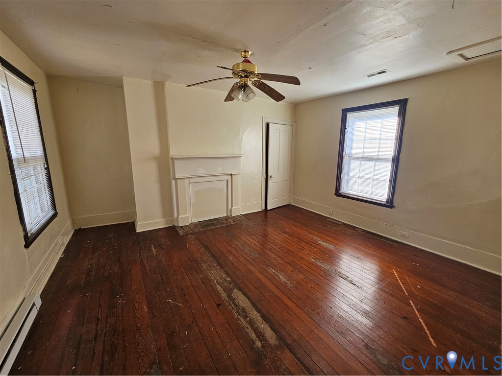 9330 Halls Run Road Chesterfield, VA 23832 - Photo 11 of 11 Unfurnished living room with a baseboard radiator
