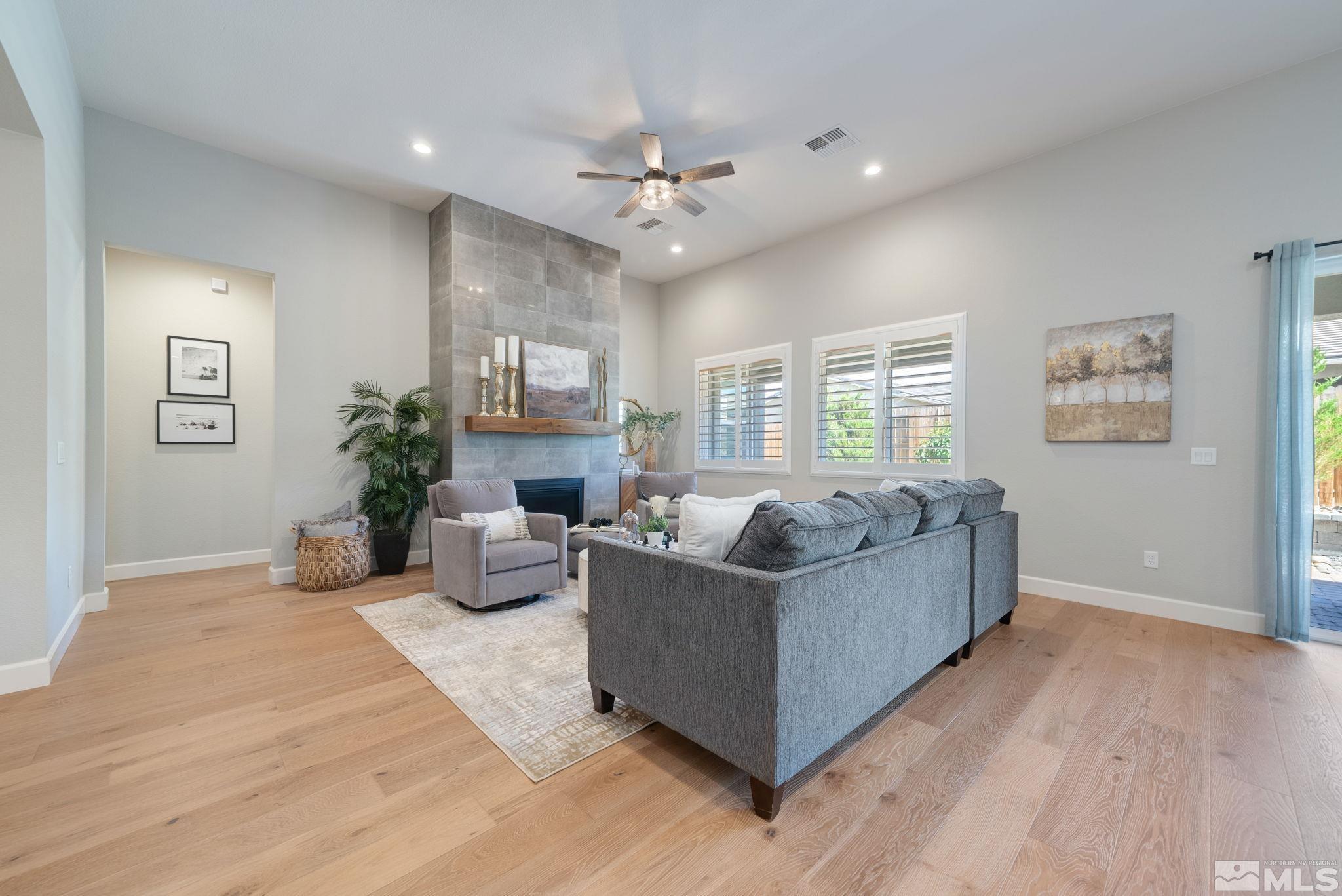 2450 Buttermere Court Reno, NV 89521 - Photo 2 of 39 a living room with furniture and a large window
