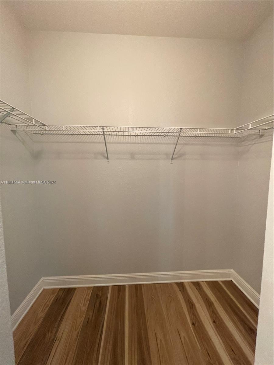 974 Southwest 147th Avenue, Unit 2601 Pembroke Pines, FL 33027 - Photo 25 of 39 master closet