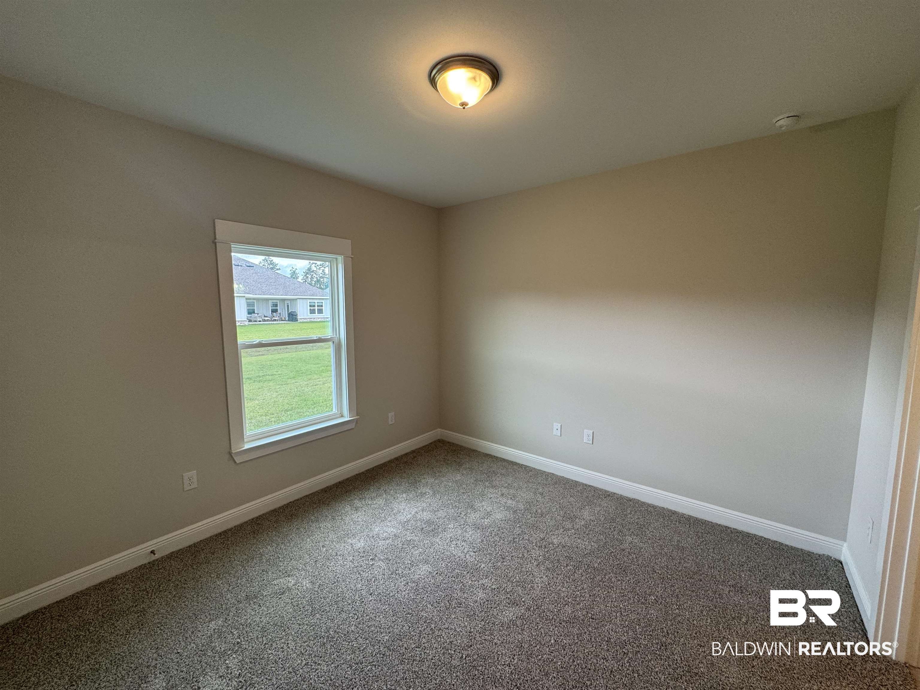 23620 Travis Stock Street, Unit 46 Foley, AL 36535 - Photo 22 of 30 Spacious bedroom with jack and Jill bathroom attached