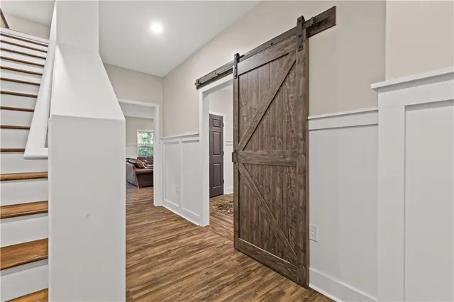 a view of entryway with wooden floor