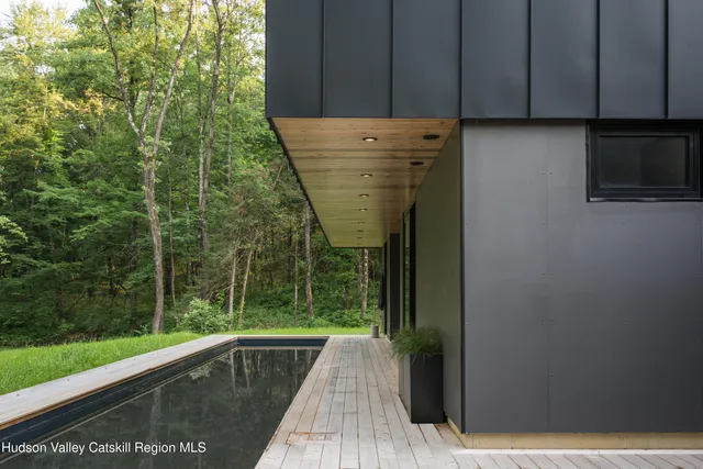 a view of swimming pool from a balcony
