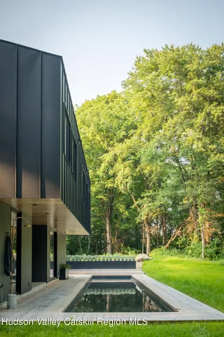 a view of balcony with wooden floor