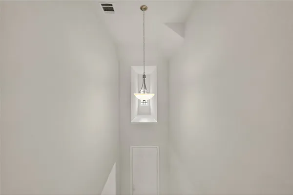 a view of livingroom with furniture and a fireplace