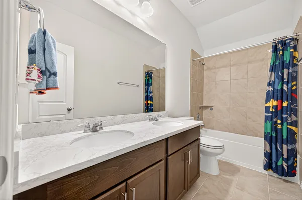 a big room with windows and closet