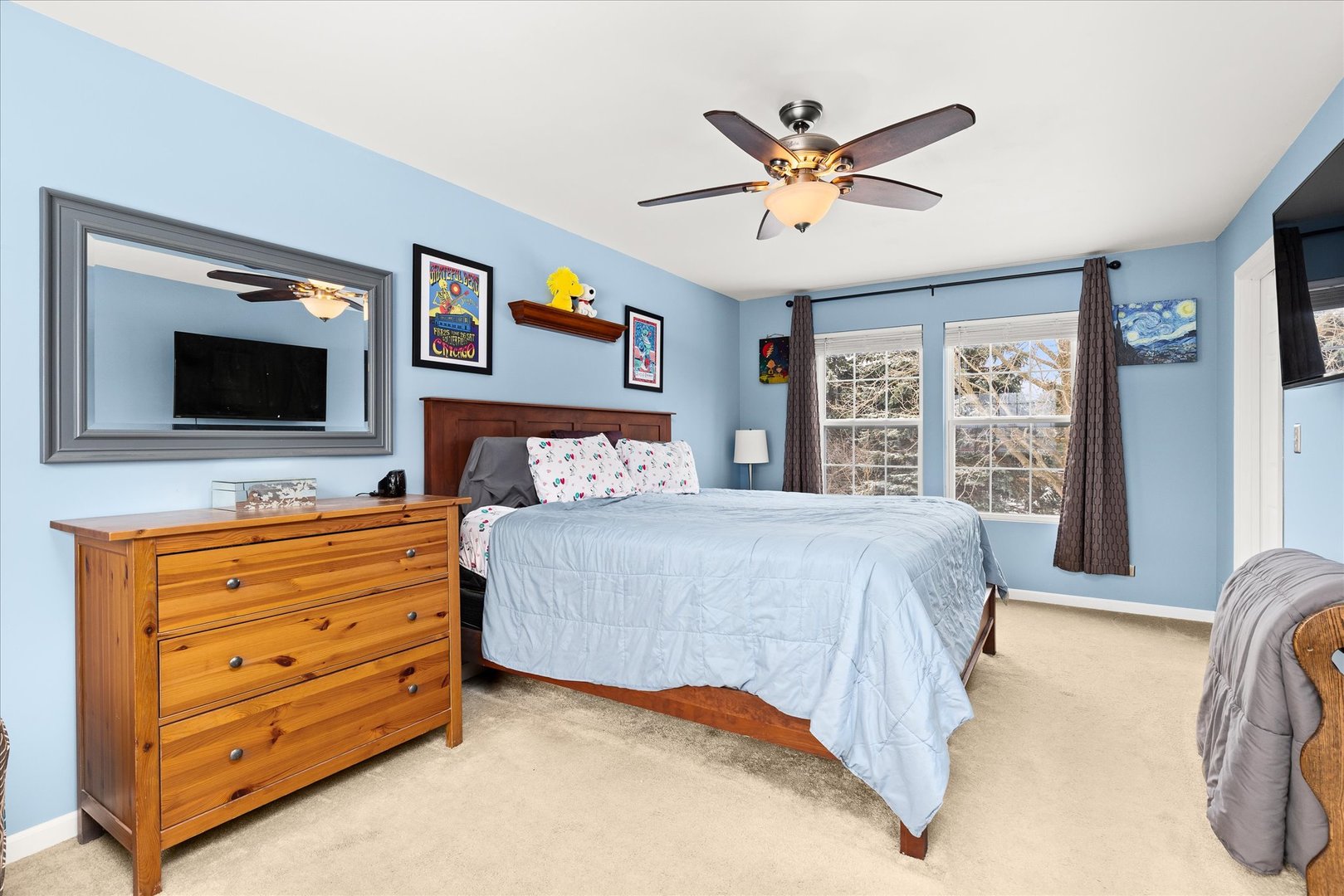 16830 South Parker Ridge Drive Lockport, IL 60441 - Photo 19 of 35 a bedroom with a bed and a flat screen tv