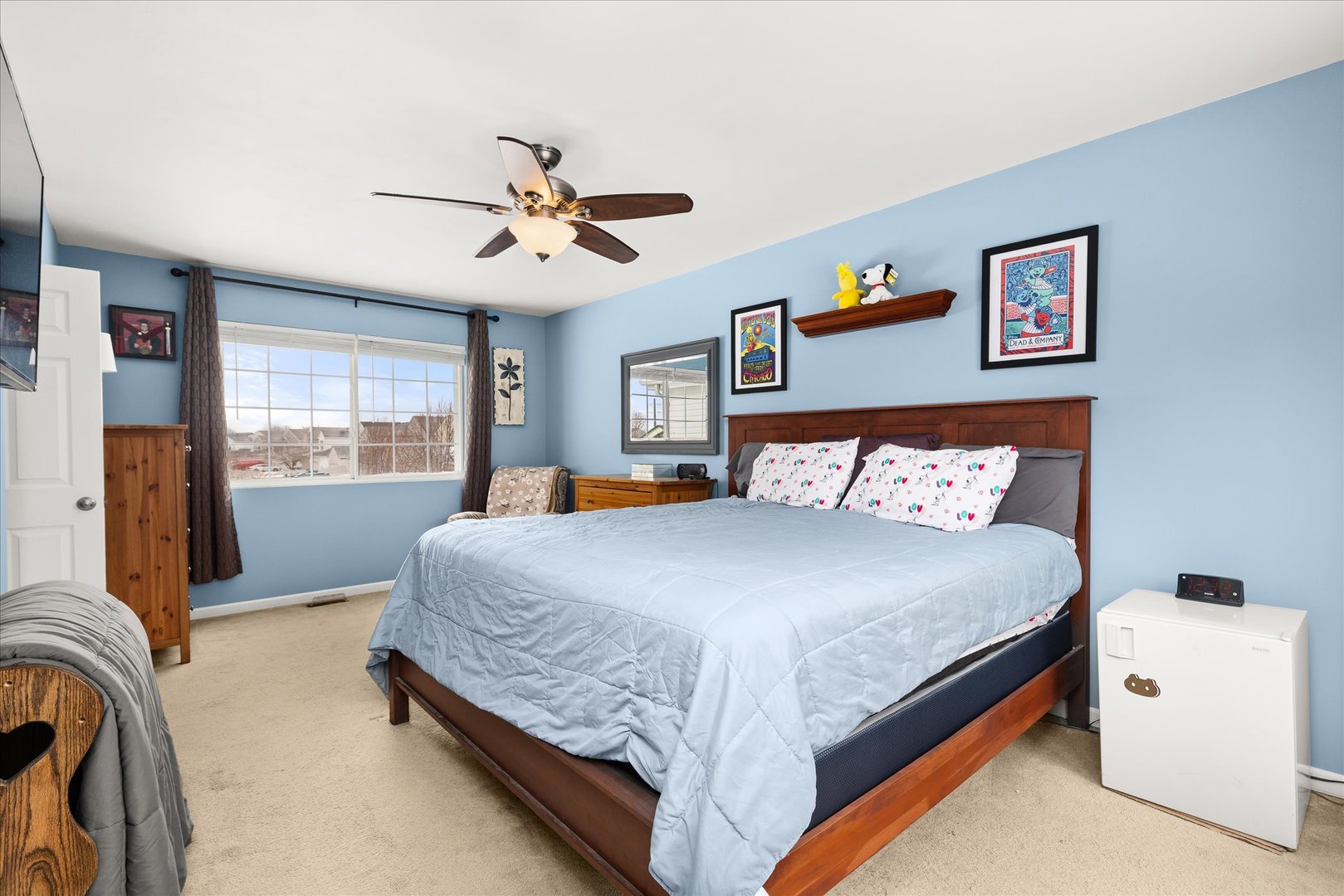 16830 South Parker Ridge Drive Lockport, IL 60441 - Photo 21 of 35 a bedroom with a large bed and a window