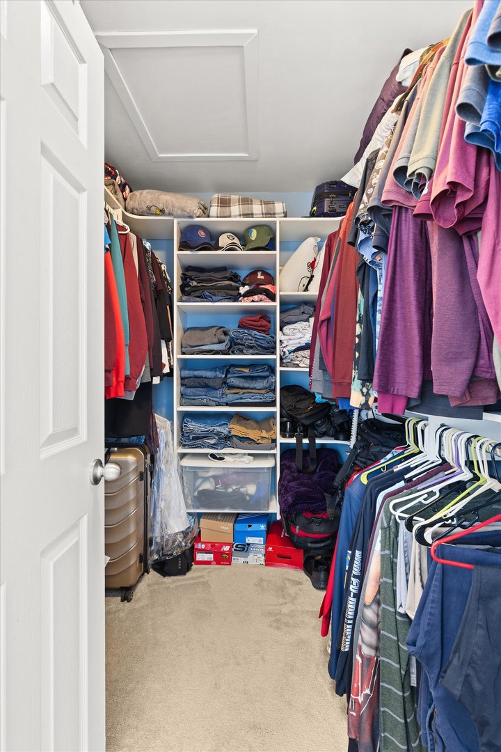 16830 South Parker Ridge Drive Lockport, IL 60441 - Photo 22 of 35 a view of walk in closet with clothes and shoes
