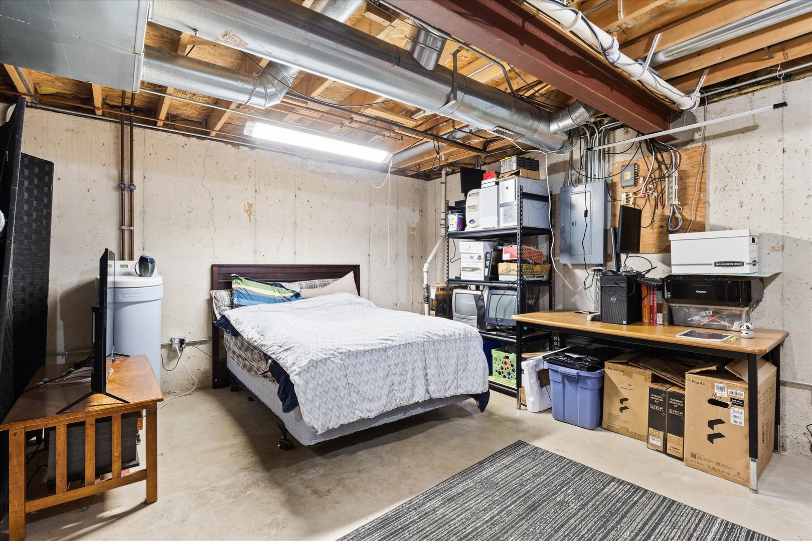 16830 South Parker Ridge Drive Lockport, IL 60441 - Photo 25 of 35 a bedroom with a bed and a television in it