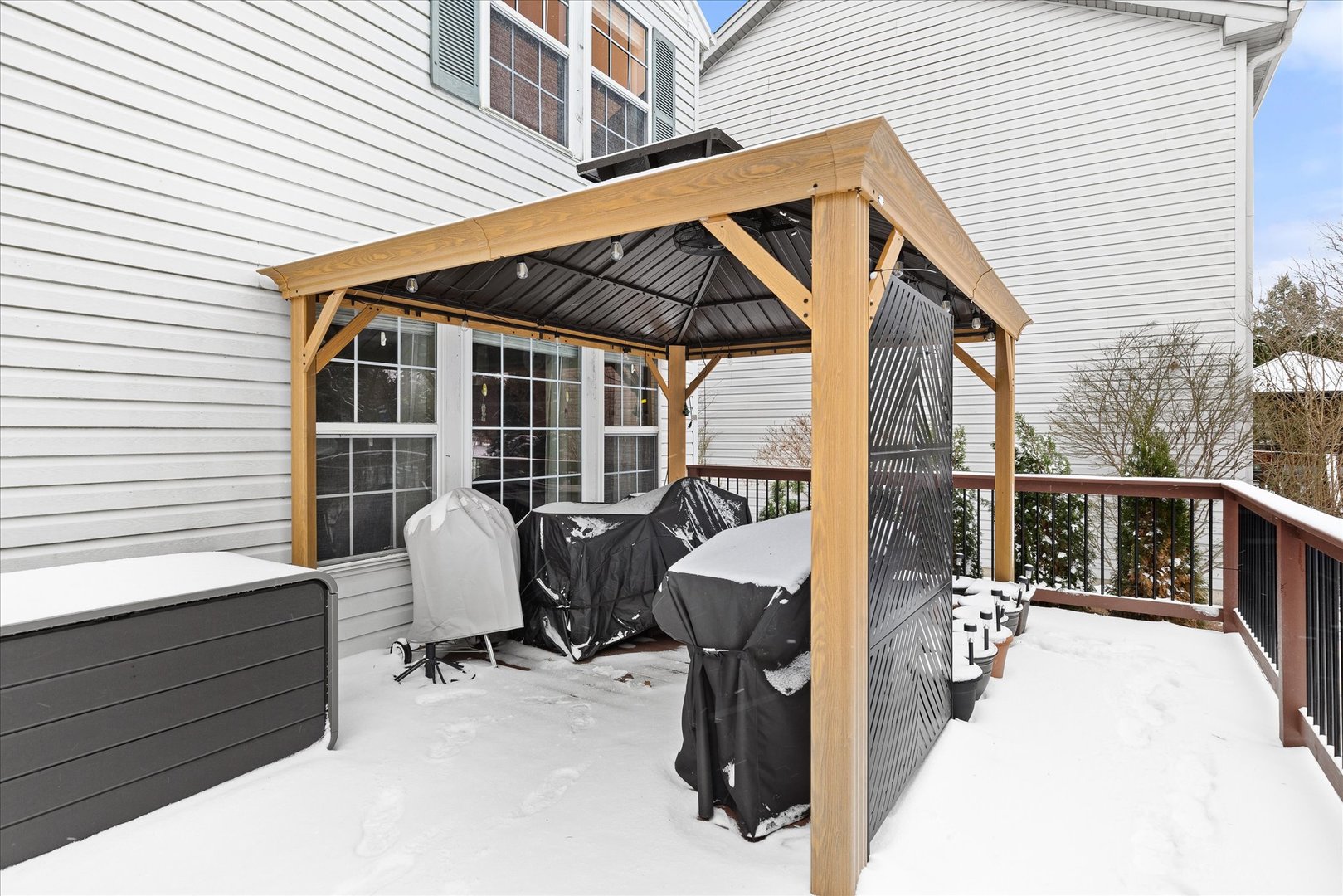 16830 South Parker Ridge Drive Lockport, IL 60441 - Photo 30 of 35 a view of a patio with a table and chairs