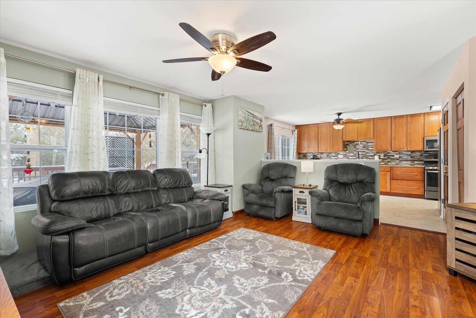 16830 South Parker Ridge Drive Lockport, IL 60441 - Photo 6 of 35 a living room with furniture and a large window