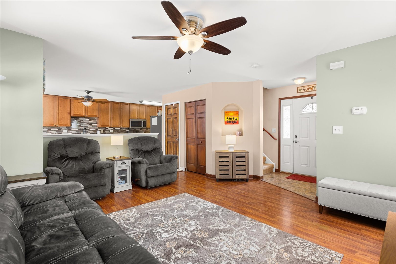 16830 South Parker Ridge Drive Lockport, IL 60441 - Photo 7 of 35 a living room with furniture and a wooden floor