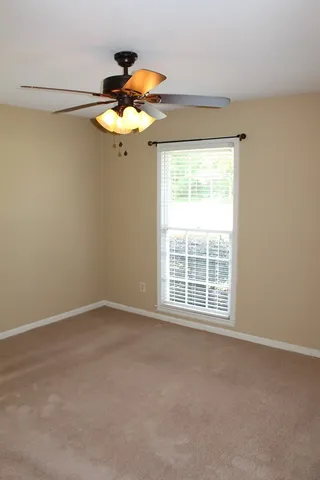 a view of a room with a window