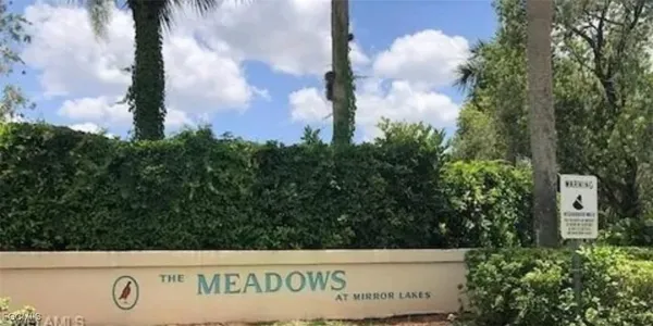 a view of a sign in a garden