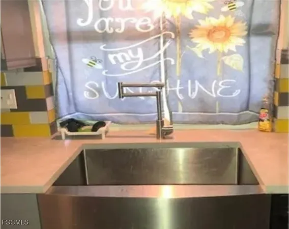 a view of a kitchen sink