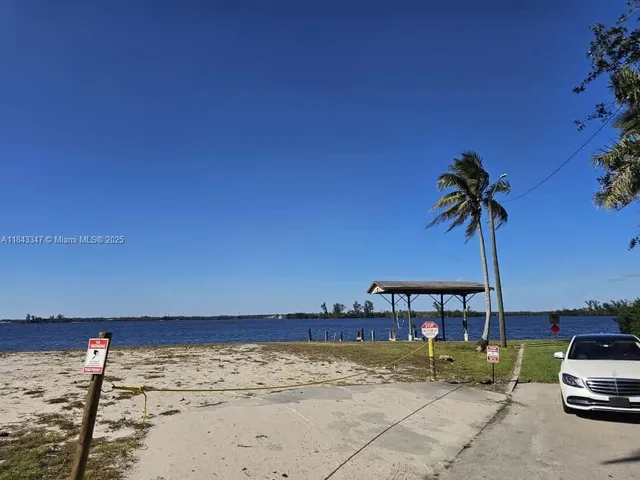 a view of a terrace with a table and chairs
