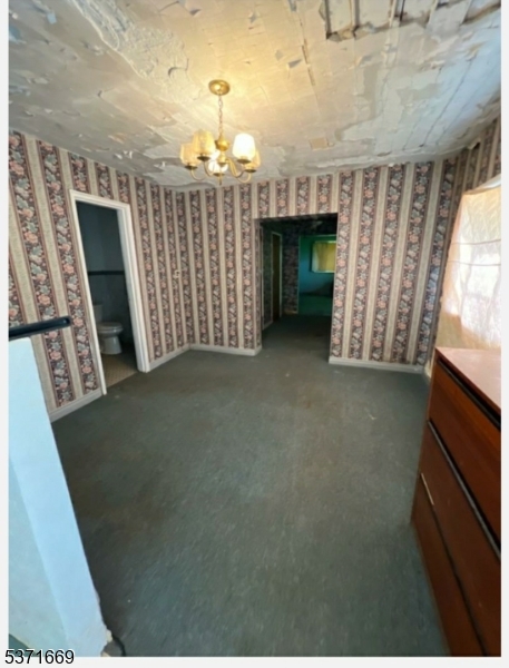 598 River Road Hillsborough, NJ 08844 - Photo 9 of 9 a view of a livingroom with furniture and staircase