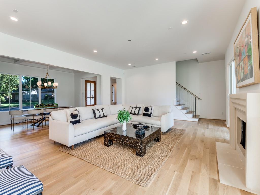 3838 Princess Lane Dallas, TX 75229 - Photo 8 of 26 a living room with furniture and a fireplace