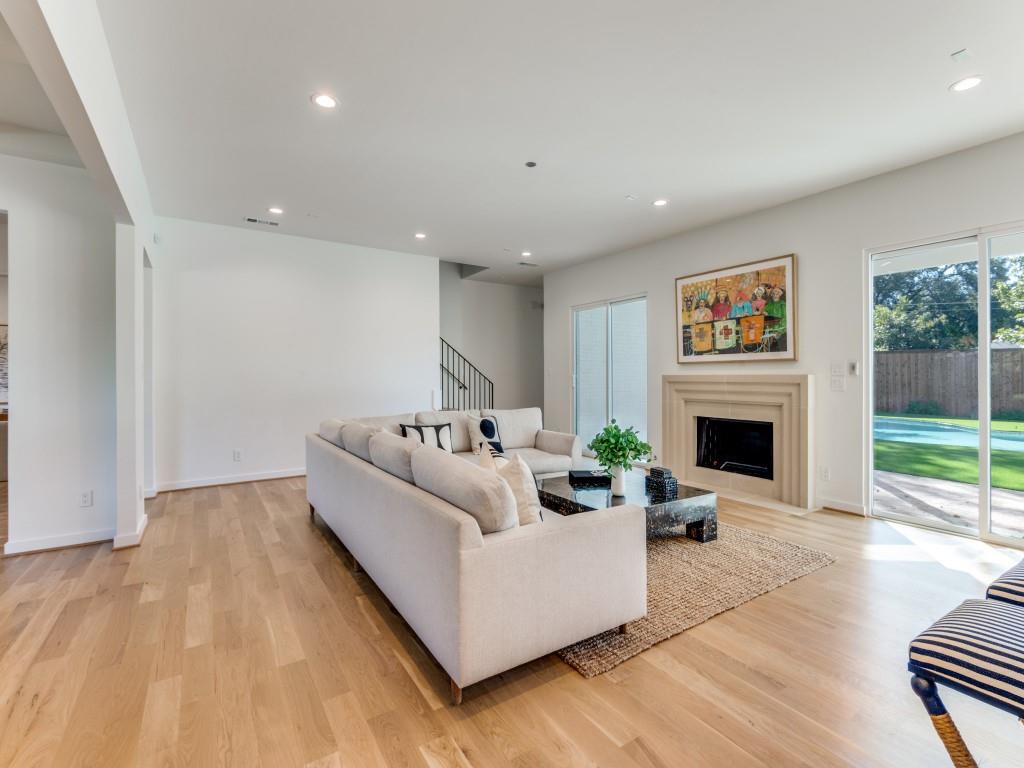 3838 Princess Lane Dallas, TX 75229 - Photo 9 of 26 a living room with furniture and a fireplace