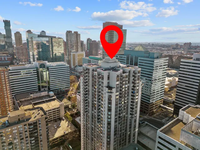 a view of a city with tall buildings