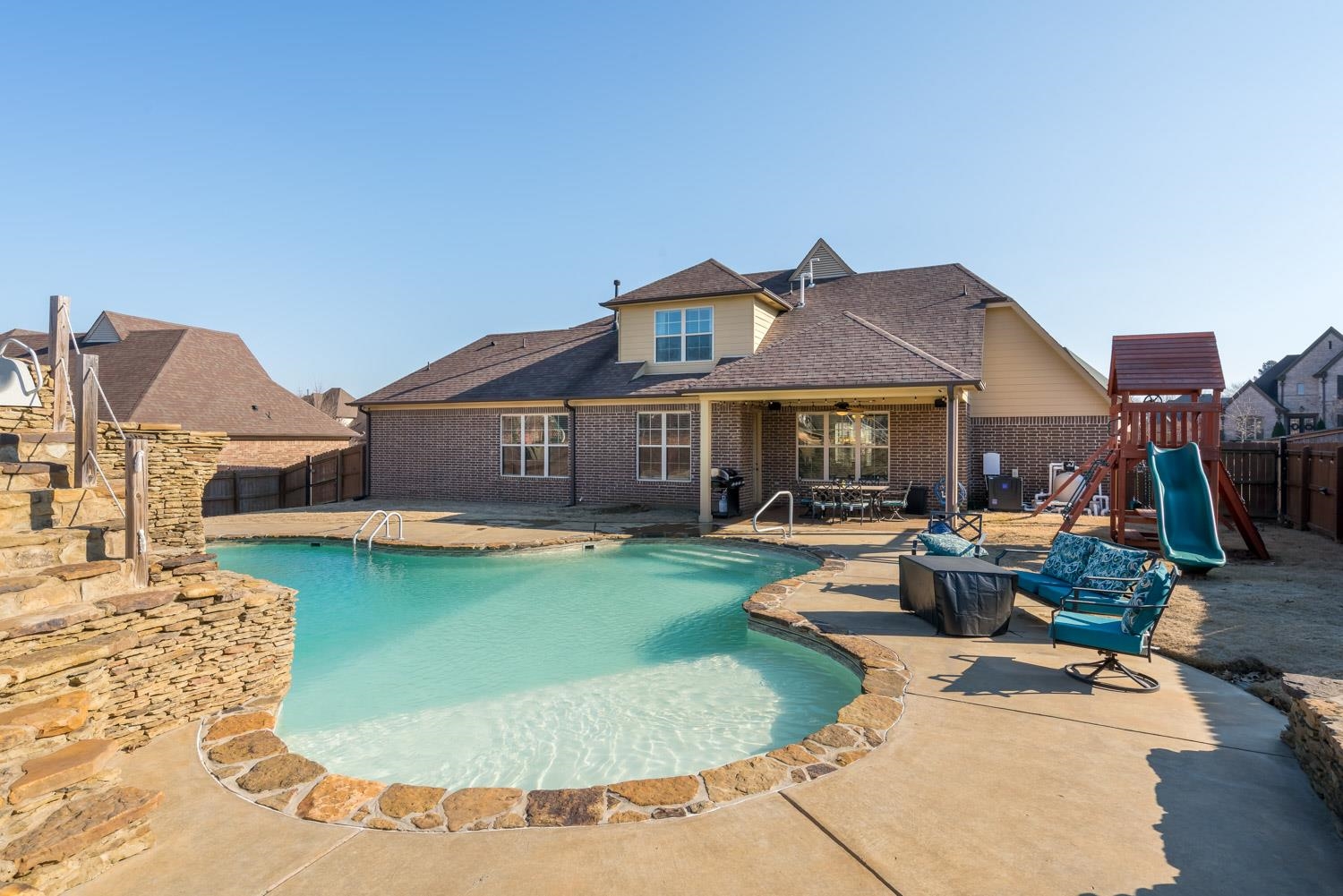 254 Estanaula Road Collierville, TN 38017 - Photo 23 of 25 a view of a house with swimming pool and sitting area