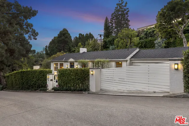 front view of a house with a street