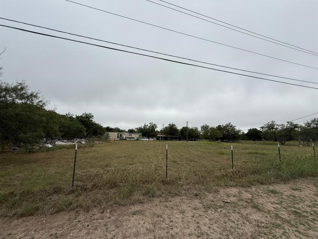 900 North Tiffin Road Ranger, TX 76470 - Photo 6 of 33 a view of a field with wooden fence