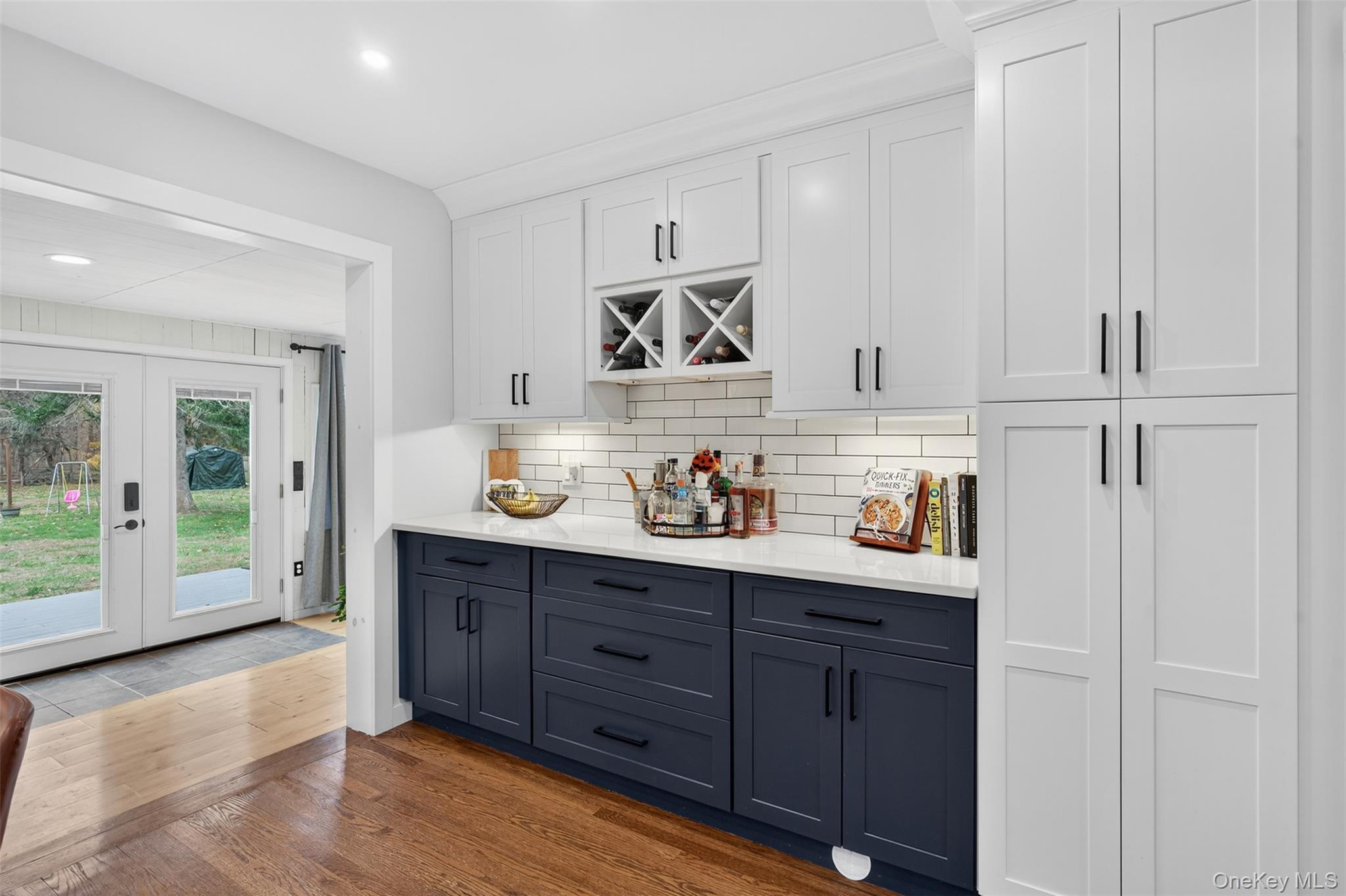51 Ward Place Fishkill, NY 12524 - Photo 11 of 25 a kitchen with stainless steel appliances granite countertop a sink dishwasher stove and cabinets with wooden floor