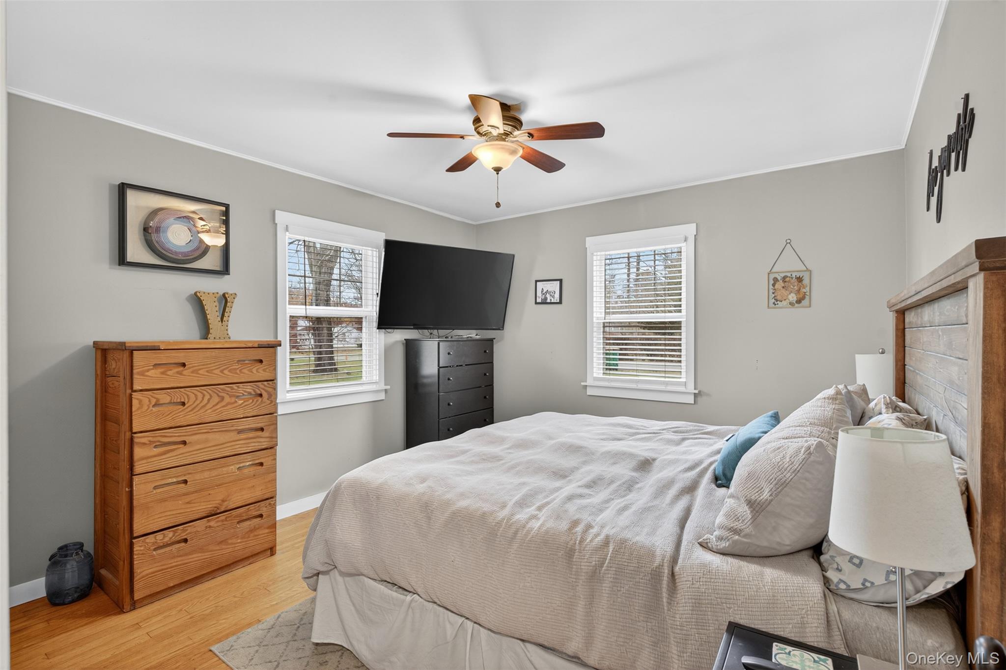 51 Ward Place Fishkill, NY 12524 - Photo 15 of 25 a bedroom with a bed and a flat screen tv