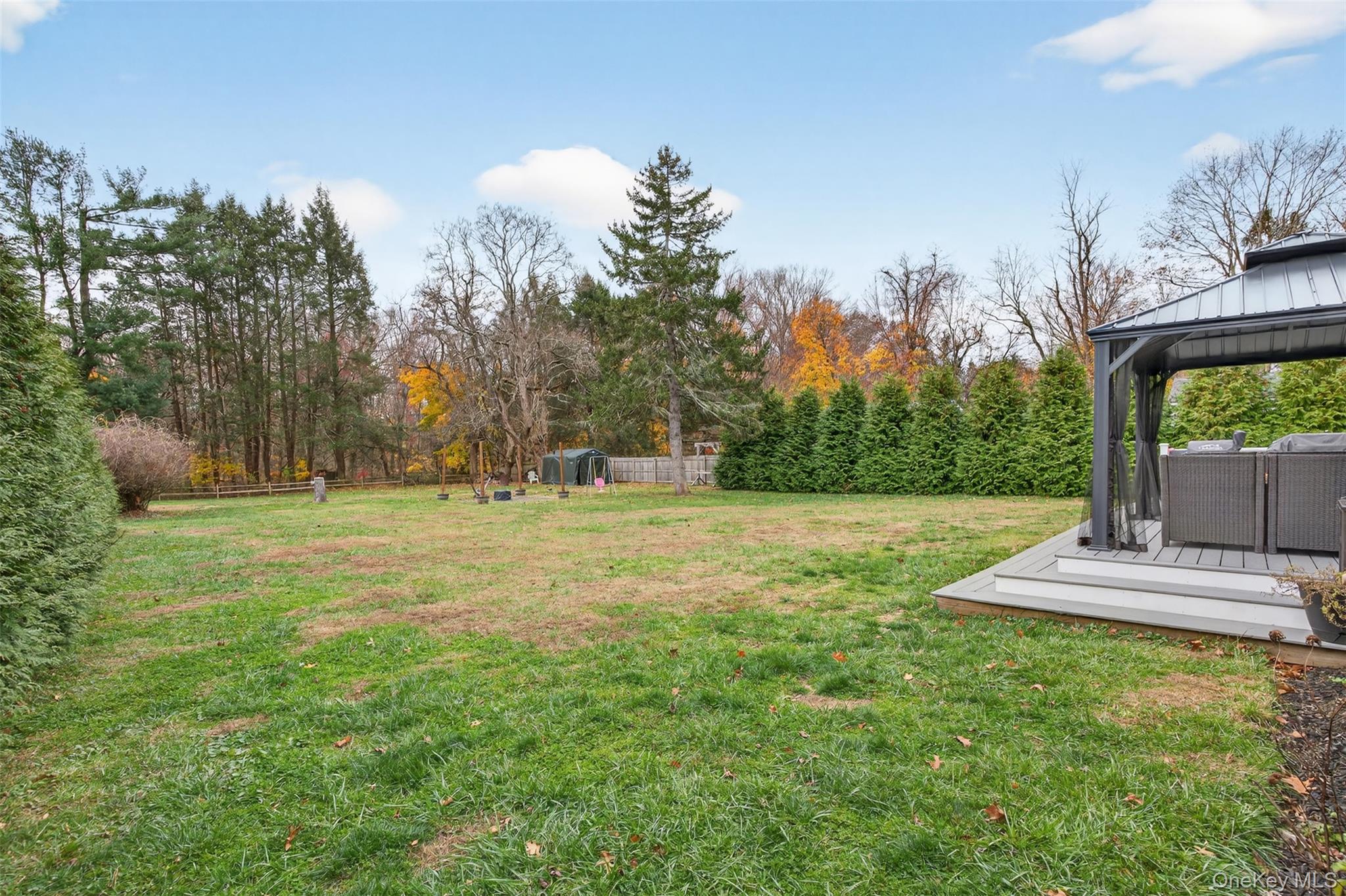 51 Ward Place Fishkill, NY 12524 - Photo 20 of 25 a view of a fountain in front of a house with large trees