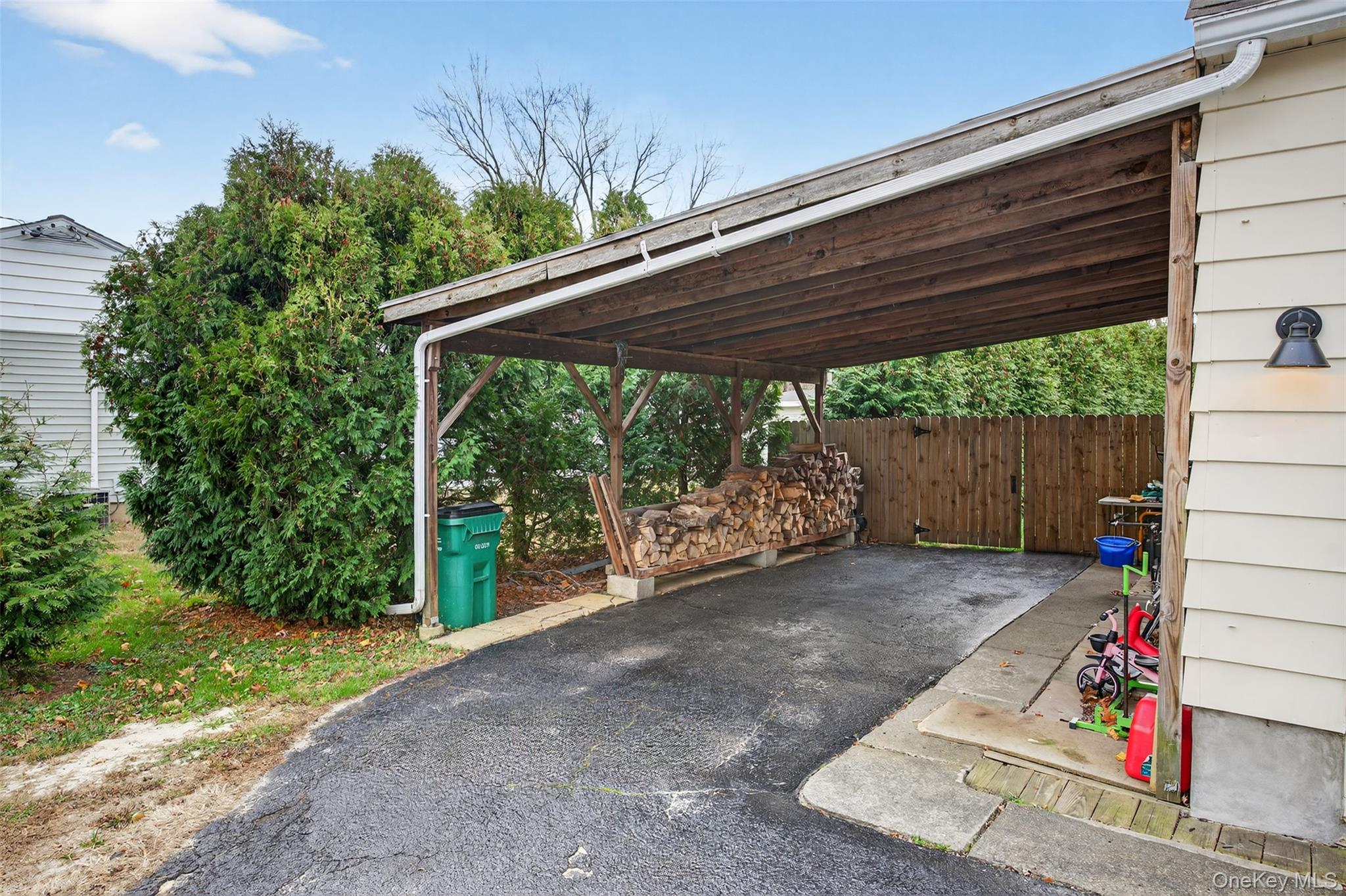 51 Ward Place Fishkill, NY 12524 - Photo 24 of 25 a view of a backyard with a small cabin and wooden fence