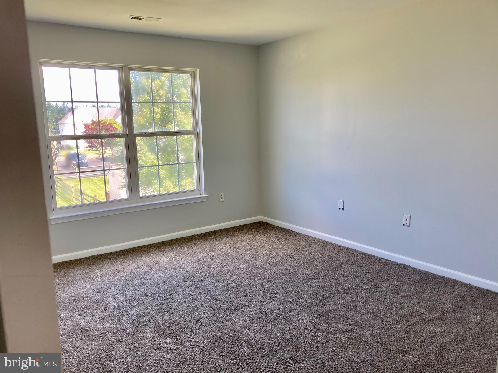 227 Mariners Way Bear, DE 19701 - Photo 18 of 19 an empty room with a window